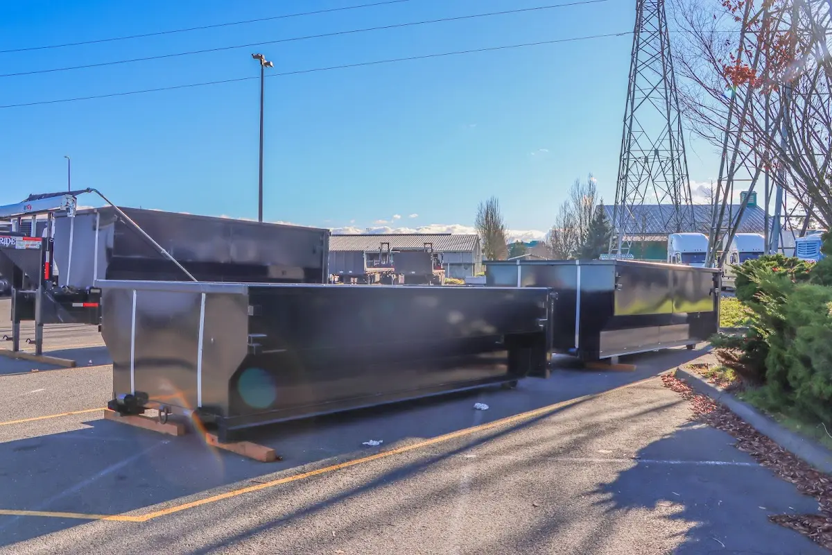 Roll-off dumpster ready for waste disposal at job site for Yard Waste Dumpster Rental in Great Falls